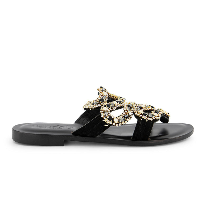 Sandaly Maiori are handmade luxury leather flat sandals, made in Italy with premium black Tuscan leather and Swarovski snake-shaped jewel accessory.